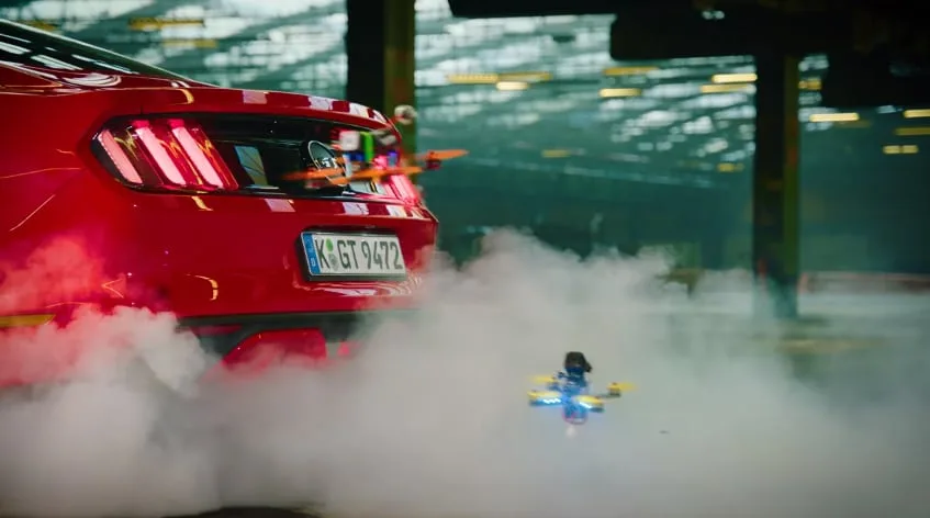 The Ford Mustang provides smoke on the dronekhana course